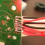 Button connection wires soldered onto existing board connections Button connection wires soldered onto existing board connections