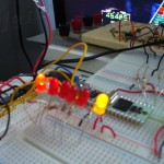 Red LEDs - 5 notes, Yellow LED - Strum